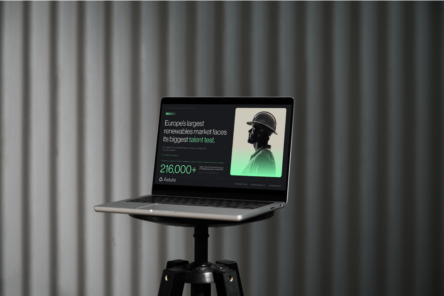 The Germany 2026 hiring intelligence report open on a laptop: 'Europe's largest renewables market faces its biggest talent test', with the 216,000+ skilled-worker shortfall stat